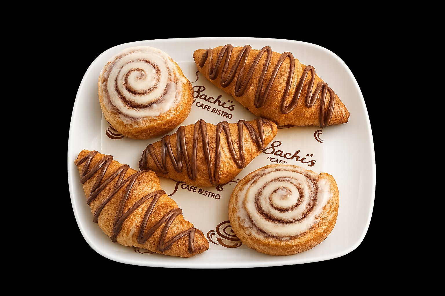 Nutella croissants and cinnamon rolls on a branded Sachi's plate